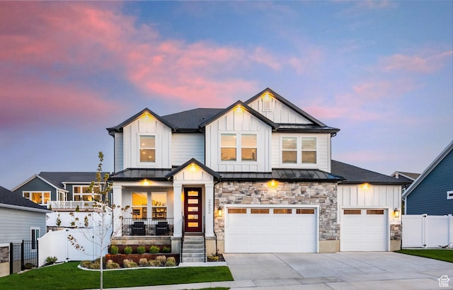 2452 E Lone Hill Dr Unit 324, Draper Ut Cnty, UT 84020 - modern farmhouse featuring board and batten siding, a standing seam roof, driveway, and a porch