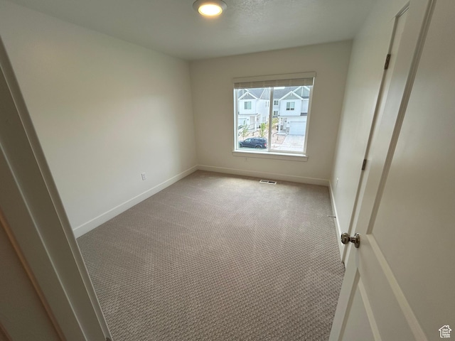 669 W 575 N Unit 552, Smithfield, UT 84335 - spare room featuring light colored carpet and recessed lighting