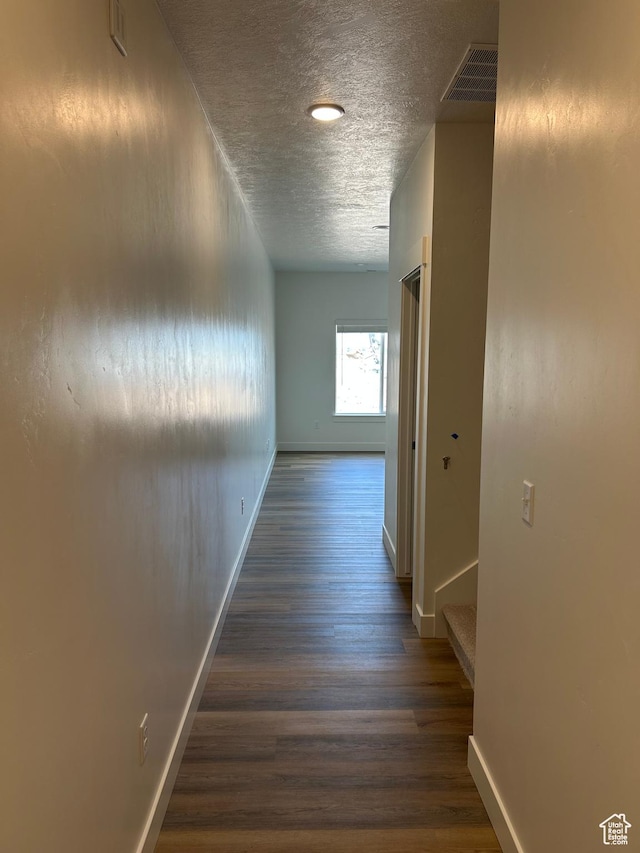 669 W 575 N Unit 552, Smithfield, UT 84335 - hall with wood finished floors, a textured ceiling, and stairs