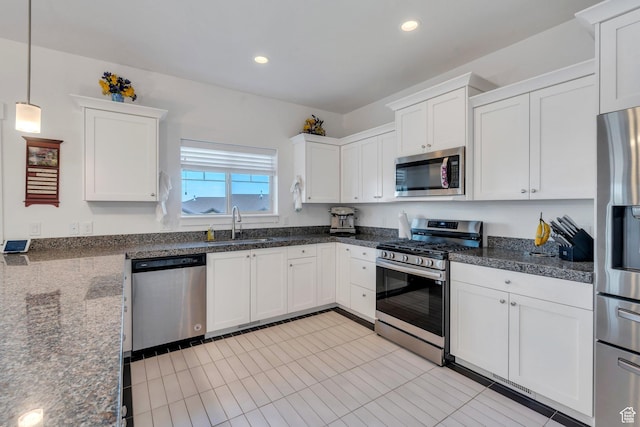 766 S Aspen Cir, Provo, UT 84606 - kitchen featuring stainless steel appliances, white cabinetry, decorative light fixtures, recessed lighting, and light tile patterned floors