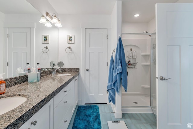 766 S Aspen Cir, Provo, UT 84606 - bathroom featuring a stall shower and double vanity