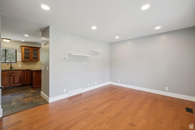 8892 S Flatiron Dr, Sandy, UT 84093 - empty room with recessed lighting and dark wood-style flooring