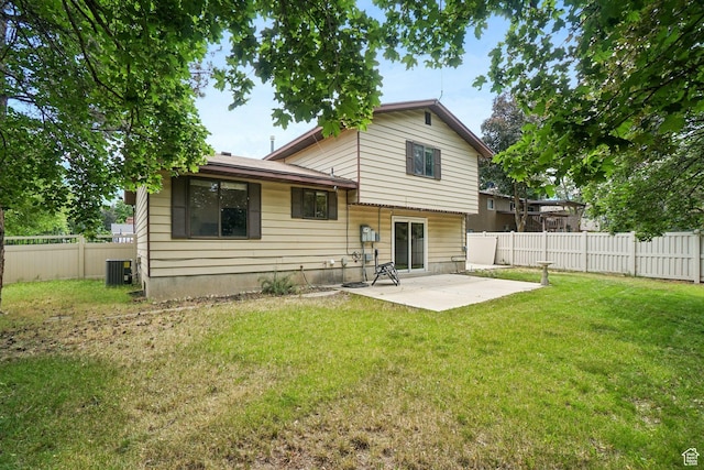 8892 S Flatiron Dr, Sandy, UT 84093 - back of house featuring a patio and a fenced backyard