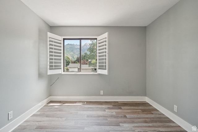 8892 S Flatiron Dr, Sandy, UT 84093 - spare room featuring wood finished floors
