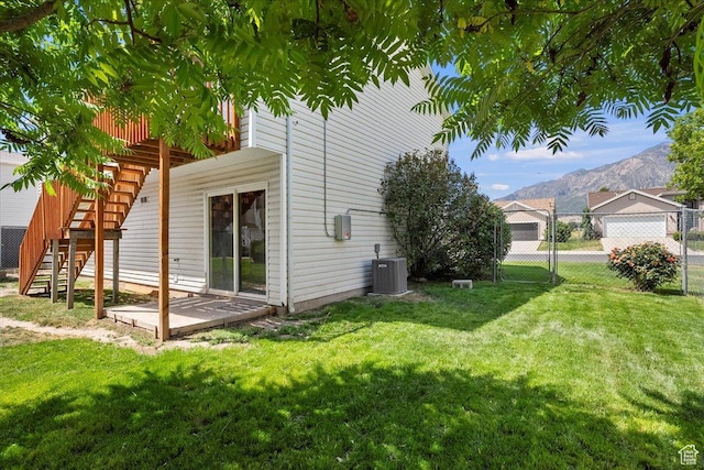 109 E 1875 N, Ogden, UT 84414 - view of side of property with a mountain view, stairway, and a gate