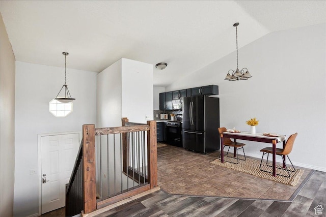 109 E 1875 N, Ogden, UT 84414 - entrance foyer with lofted ceiling, a chandelier, and dark wood finished floors