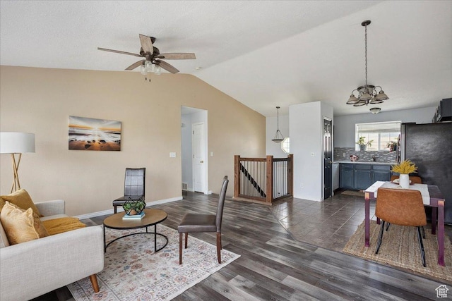 109 E 1875 N, Ogden, UT 84414 - living room with lofted ceiling, a chandelier, dark wood finished floors, and a ceiling fan