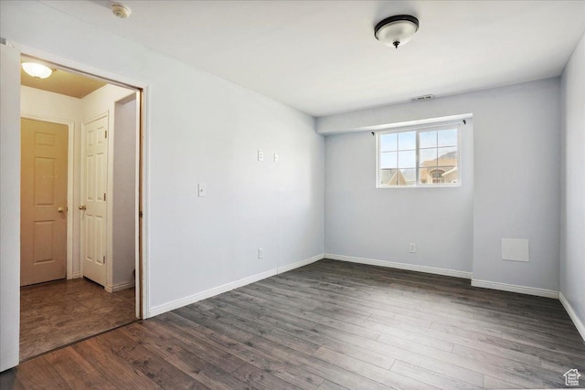109 E 1875 N, Ogden, UT 84414 - empty room featuring a smoke detector and dark wood-type flooring