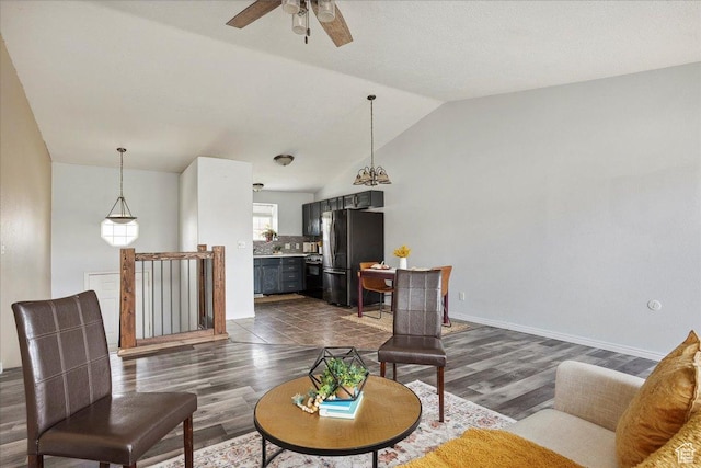 109 E 1875 N, Ogden, UT 84414 - living area featuring vaulted ceiling, ceiling fan, and dark wood-type flooring