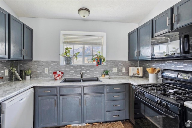 109 E 1875 N, Ogden, UT 84414 - kitchen featuring black appliances, backsplash, light countertops, and a textured ceiling