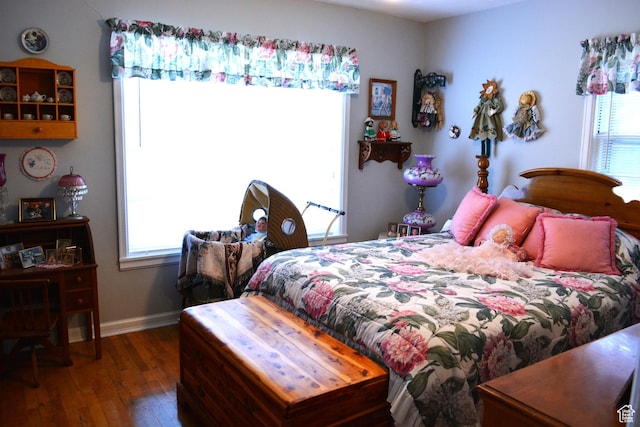 114 W 7th St, Georgetown, ID 83239 - bedroom featuring hardwood / wood-style floors and multiple windows