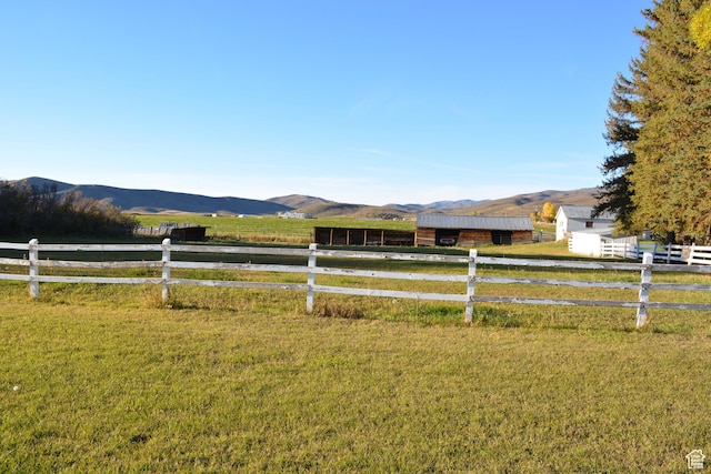 114 W 7th St, Georgetown, ID 83239 - view of yard featuring a rural view, a mountain view, and an outdoor structure