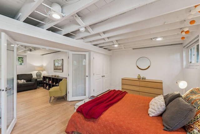 1710 E 900 S, Salt Lake City, UT 84108 - bedroom with light wood-type flooring and french doors
