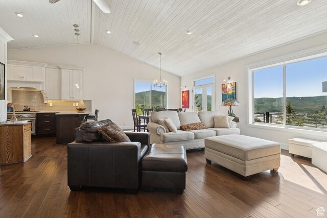 3922 View Pointe Dr, Park City, UT 84098 - living room with a chandelier, ceiling fan, dark wood-style floors, lofted ceiling, and a mountain view