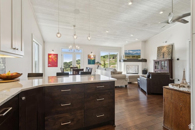 3922 View Pointe Dr, Park City, UT 84098 - kitchen featuring dark wood finished floors, dark brown cabinetry, a chandelier, white cabinets, and hanging light fixtures