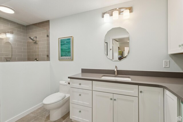 3922 View Pointe Dr, Park City, UT 84098 - bathroom featuring vanity, a tile shower, and tile patterned floors
