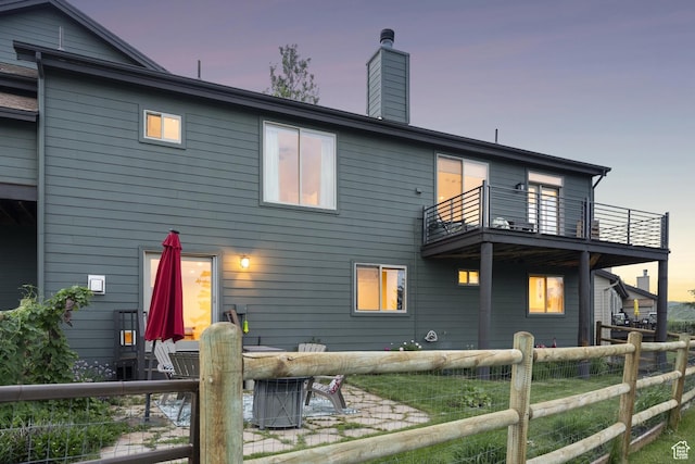 3922 View Pointe Dr, Park City, UT 84098 - rear view of property featuring a balcony, a chimney, and a patio