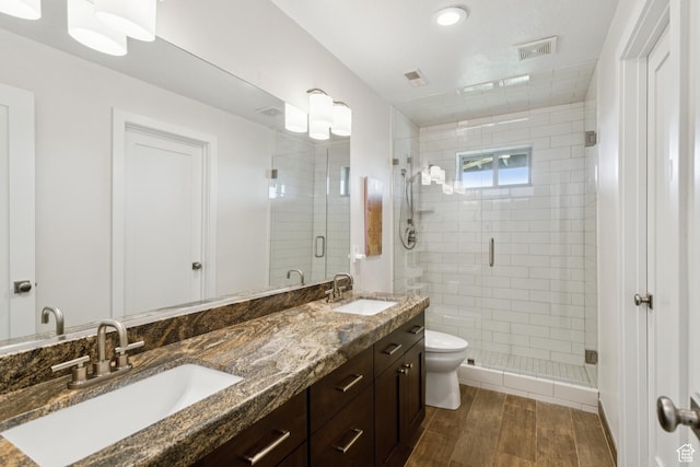 3922 View Pointe Dr, Park City, UT 84098 - bathroom featuring wood finished floors, double vanity, and a shower stall