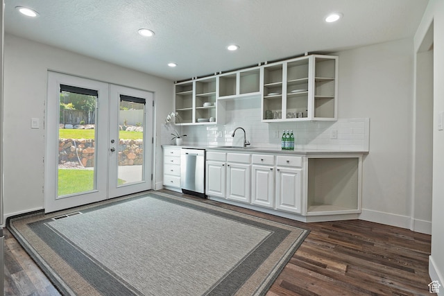 7669 S 1130 E, Midvale, UT 84047 - kitchen with open shelves, dishwasher, french doors, tasteful backsplash, and dark wood-type flooring
