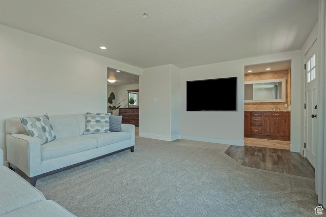 7669 S 1130 E, Midvale, UT 84047 - living room featuring carpet flooring and recessed lighting