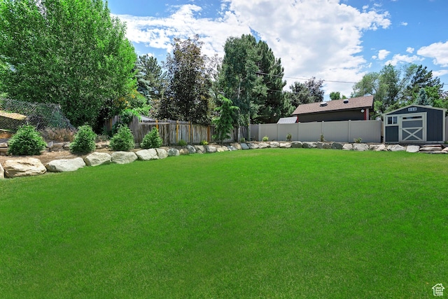 7669 S 1130 E, Midvale, UT 84047 - fenced backyard featuring a storage shed