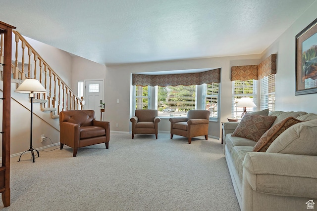 1222 E Big Pine Cir, Sandy, UT 84094 - living room featuring carpet, stairway, and a textured ceiling