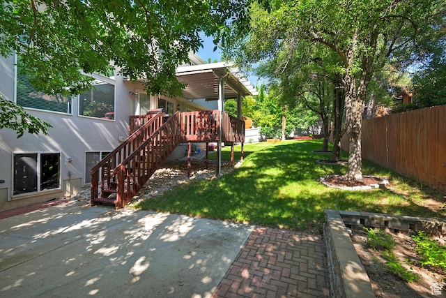 1222 E Big Pine Cir, Sandy, UT 84094 - view of yard featuring a patio, a wooden deck, and stairs