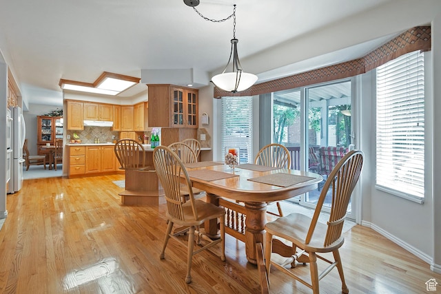 1222 E Big Pine Cir, Sandy, UT 84094 - dining room featuring baseboards and light wood-type flooring