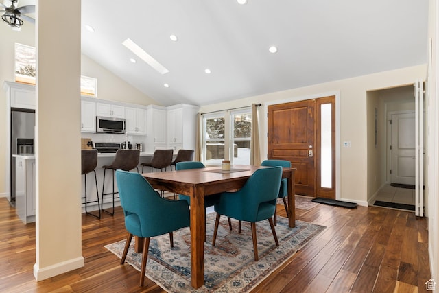 3569 E Avondale Dr S, Cottonwood Heights, UT 84121 - dining space with dark wood-style floors, high vaulted ceiling, a skylight, and recessed lighting