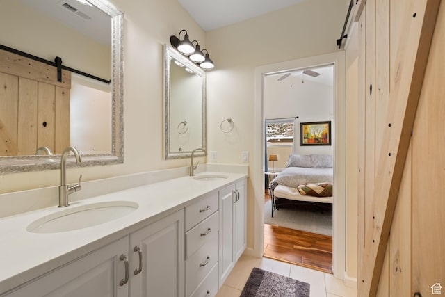 3569 E Avondale Dr S, Cottonwood Heights, UT 84121 - full bathroom with tile patterned flooring, double vanity, a ceiling fan, and ensuite bathroom