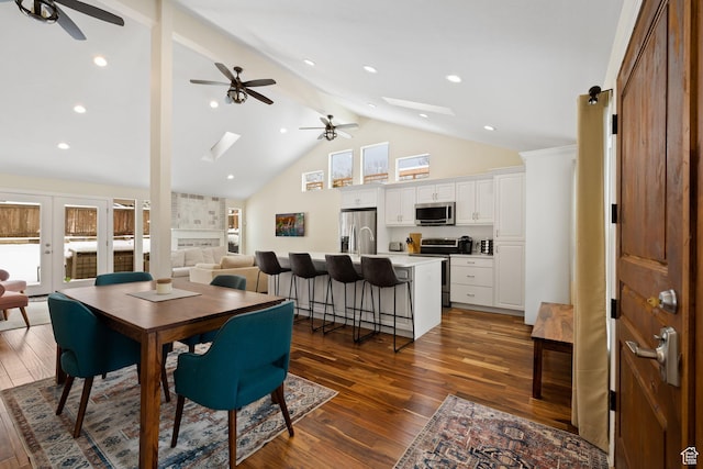 3569 E Avondale Dr S, Cottonwood Heights, UT 84121 - dining area featuring a ceiling fan, a skylight, dark wood-style floors, beamed ceiling, and high vaulted ceiling
