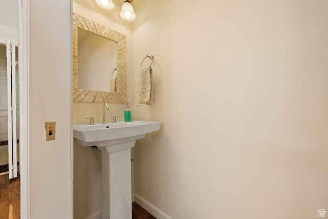 3569 E Avondale Dr S, Cottonwood Heights, UT 84121 - bathroom featuring baseboards and wood finished floors