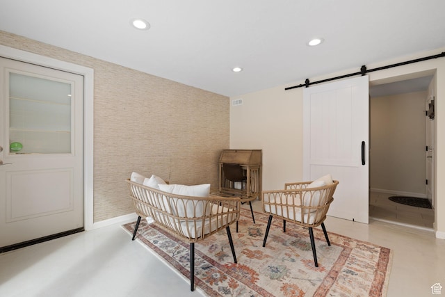 3569 E Avondale Dr S, Cottonwood Heights, UT 84121 - sitting room with a barn door, recessed lighting, wallpapered walls, and an accent wall