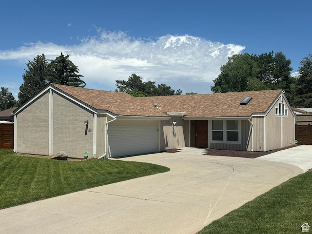 3569 E Avondale Dr S, Cottonwood Heights, UT 84121 - single story home featuring concrete driveway, a garage, a front lawn, and a shingled roof