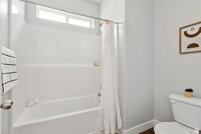 14654 S Bloom Dr W Unit K301, Herriman, UT 84096 - bathroom featuring shower / bathtub combination with curtain and wood finished floors