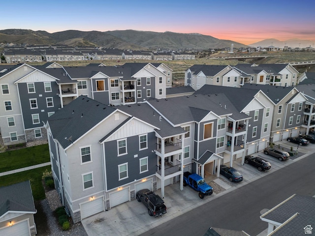 14654 S Bloom Dr W Unit K301, Herriman, UT 84096 - aerial view at dusk of a mountain view and a residential view