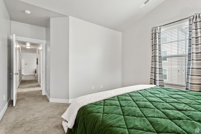 14654 S Bloom Dr W Unit K301, Herriman, UT 84096 - bedroom featuring light carpet and lofted ceiling