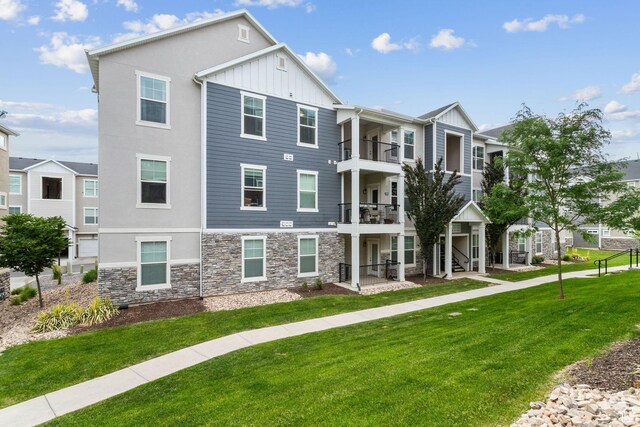 14654 S Bloom Dr W Unit K301, Herriman, UT 84096 - view of building exterior featuring a residential view