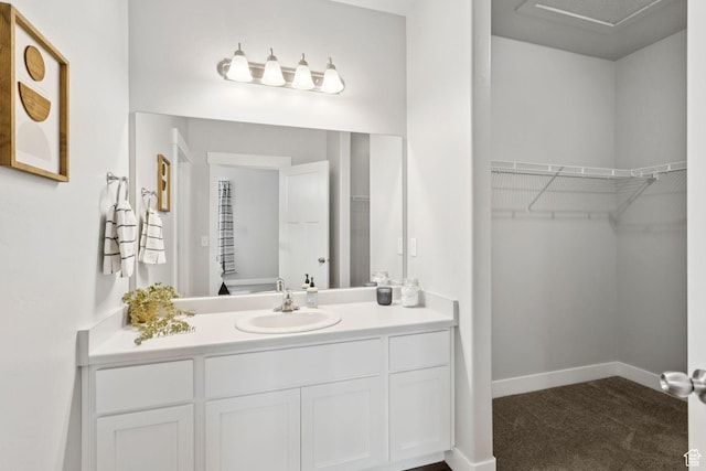 14654 S Bloom Dr W Unit K301, Herriman, UT 84096 - bathroom with vanity and a spacious closet