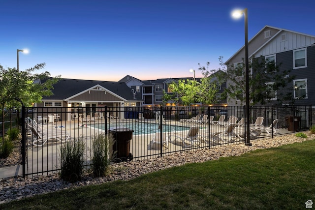 14654 S Bloom Dr W Unit K301, Herriman, UT 84096 - pool at dusk with a community pool and a patio area