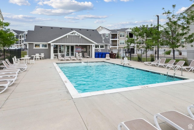 14654 S Bloom Dr W Unit K301, Herriman, UT 84096 - community pool with a patio area and a residential view