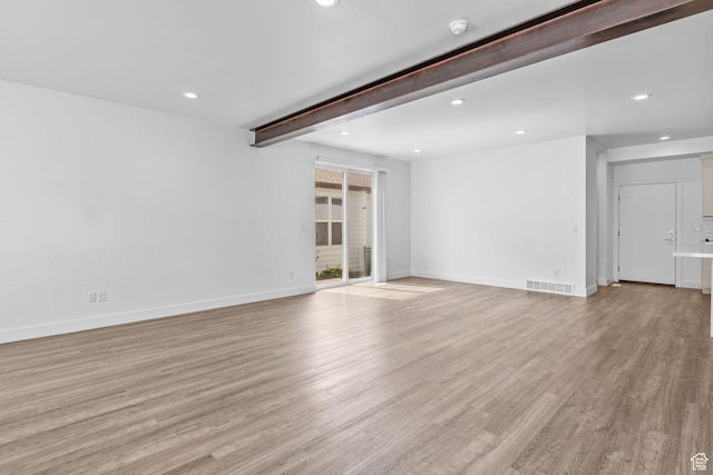 1046 W Albion Meadow Way, Bluffdale, UT 84065 - unfurnished living room featuring recessed lighting, beamed ceiling, and light wood-style flooring