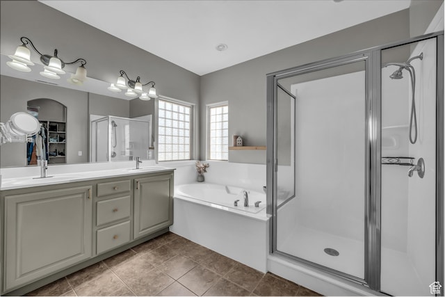 86 W 1965 S, Washington, UT 84780 - bathroom featuring a stall shower, a garden tub, double vanity, and tile patterned floors