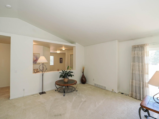 3988 W Sugar Beet Dr S, West Valley City, UT 84120 - living area featuring carpet floors, vaulted ceiling, and healthy amount of natural light