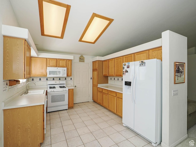 3988 W Sugar Beet Dr S, West Valley City, UT 84120 - kitchen with white appliances, light countertops, and light tile patterned floors