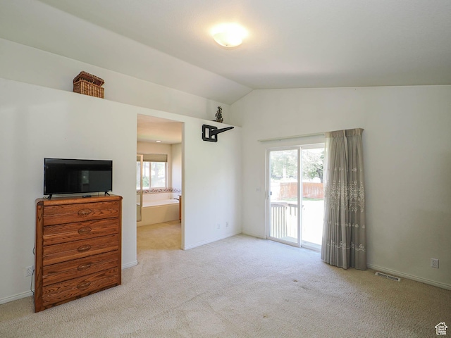 3988 W Sugar Beet Dr S, West Valley City, UT 84120 - unfurnished bedroom featuring access to outside, carpet flooring, vaulted ceiling, and ensuite bath