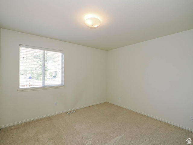 3988 W Sugar Beet Dr S, West Valley City, UT 84120 - unfurnished room featuring light colored carpet and baseboards