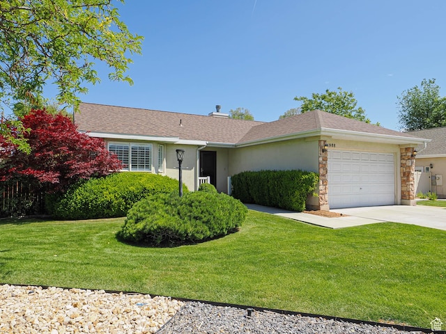 3988 W Sugar Beet Dr S, West Valley City, UT 84120 - ranch-style house with a garage, concrete driveway, stucco siding, and a front yard