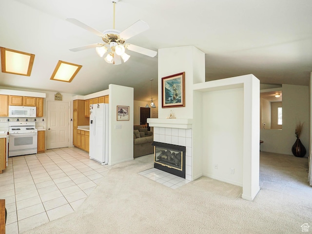 3988 W Sugar Beet Dr S, West Valley City, UT 84120 - kitchen with white appliances, light countertops, light colored carpet, lofted ceiling, and ceiling fan