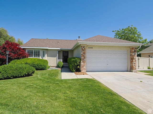 3988 W Sugar Beet Dr S, West Valley City, UT 84120 - single story home with stone siding, concrete driveway, an attached garage, stucco siding, and a shingled roof